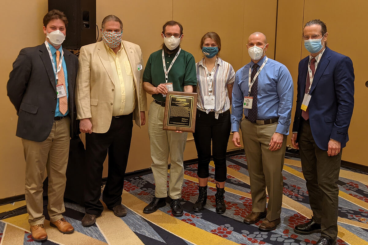 The award was received by H. Clay Gabler's students, colleagues, and friends: (from left) Luke E. Riexinger, Warren Hardy, Max Bareiss, Morgan E. Dean, Douglas Gabauer and presented by John P. Donahue, chair of the Roadside Safety Design Committee (at far