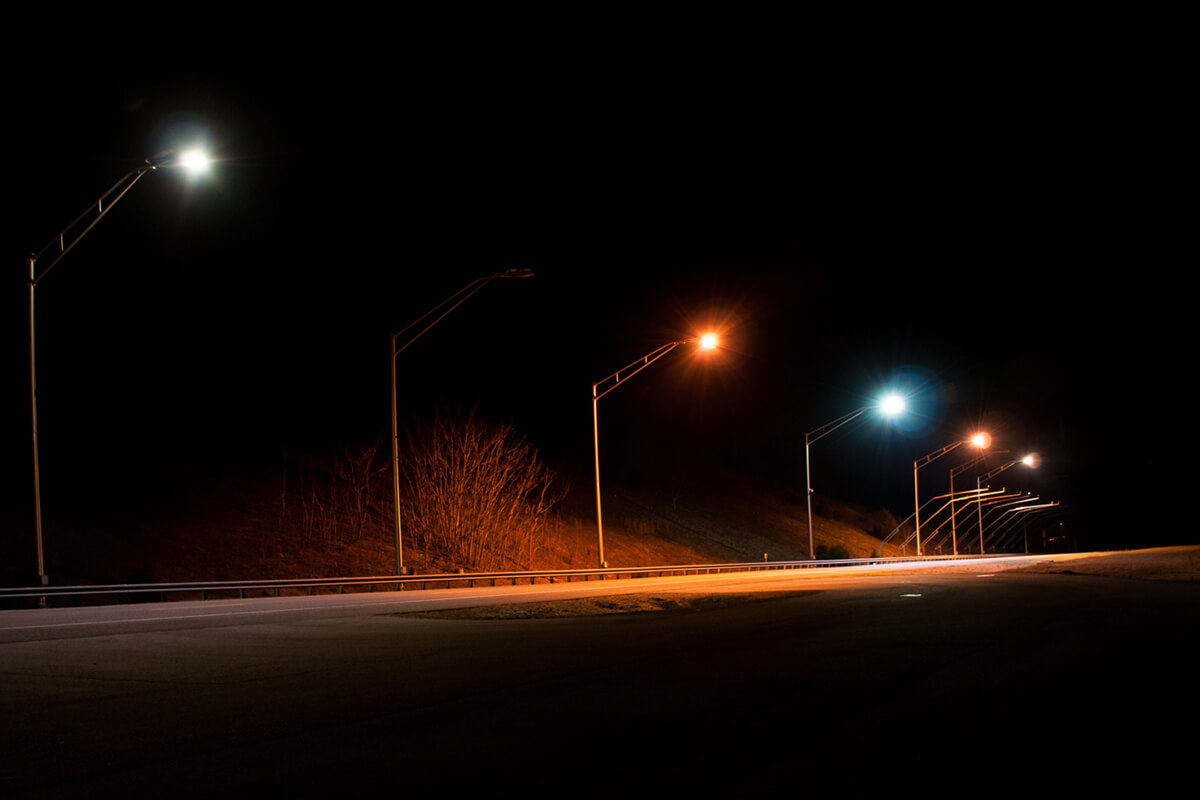 Five different lights illuminated on the Virginia Smart Roads at night.
