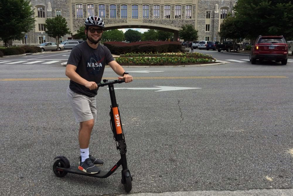 Student on an e-scooter