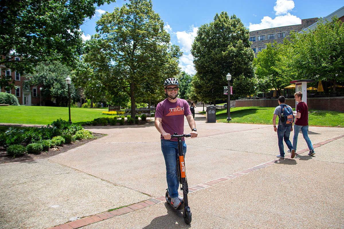 Student on an e-scooter